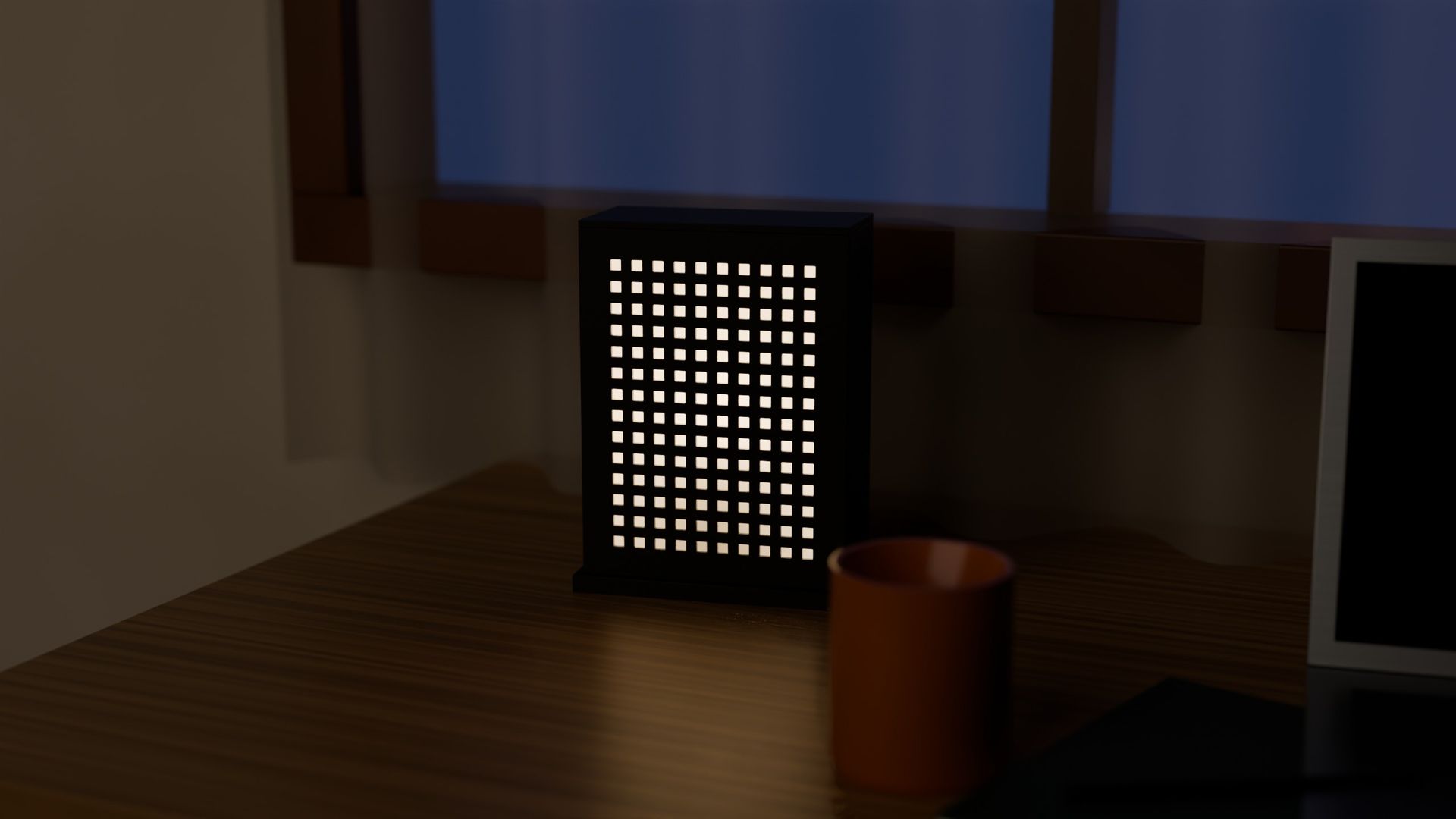 MATRIX table lamp switched on, on a desk by a window at dusk