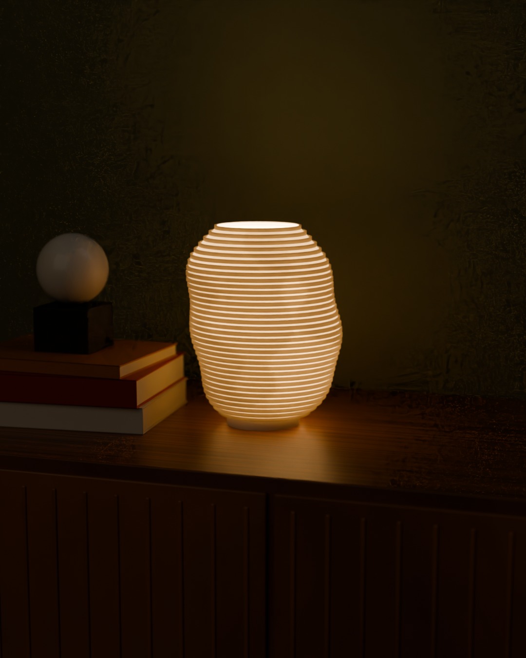 KONTUR table lamp in bone white, switched on, on a sideboard
