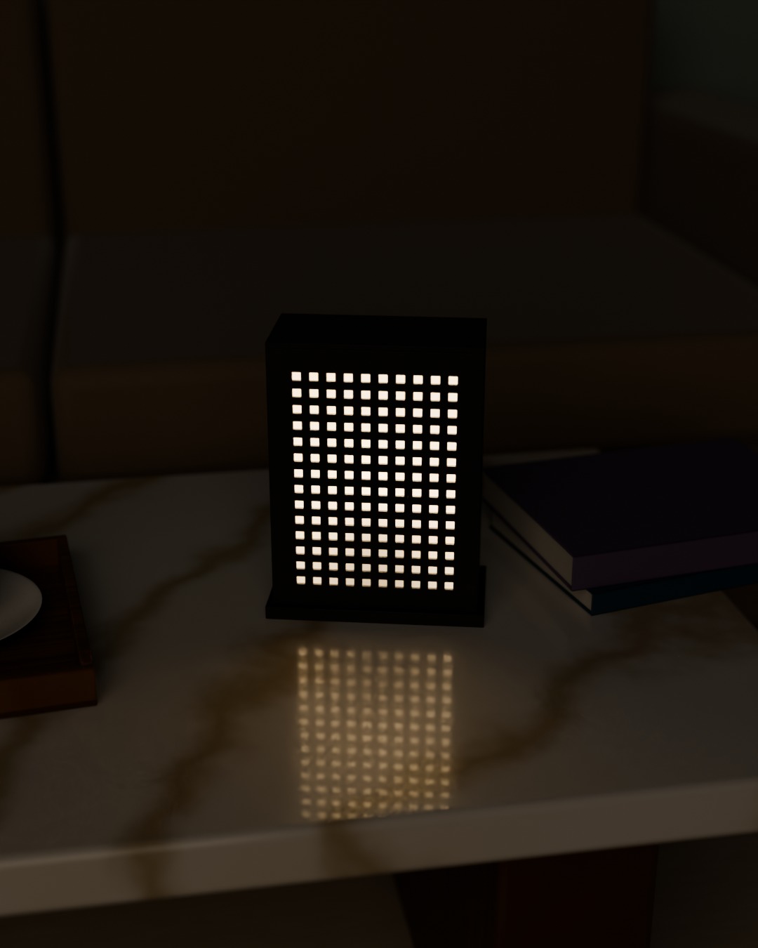 MATRIX table lamp in graphite, switched on, on a coffee table