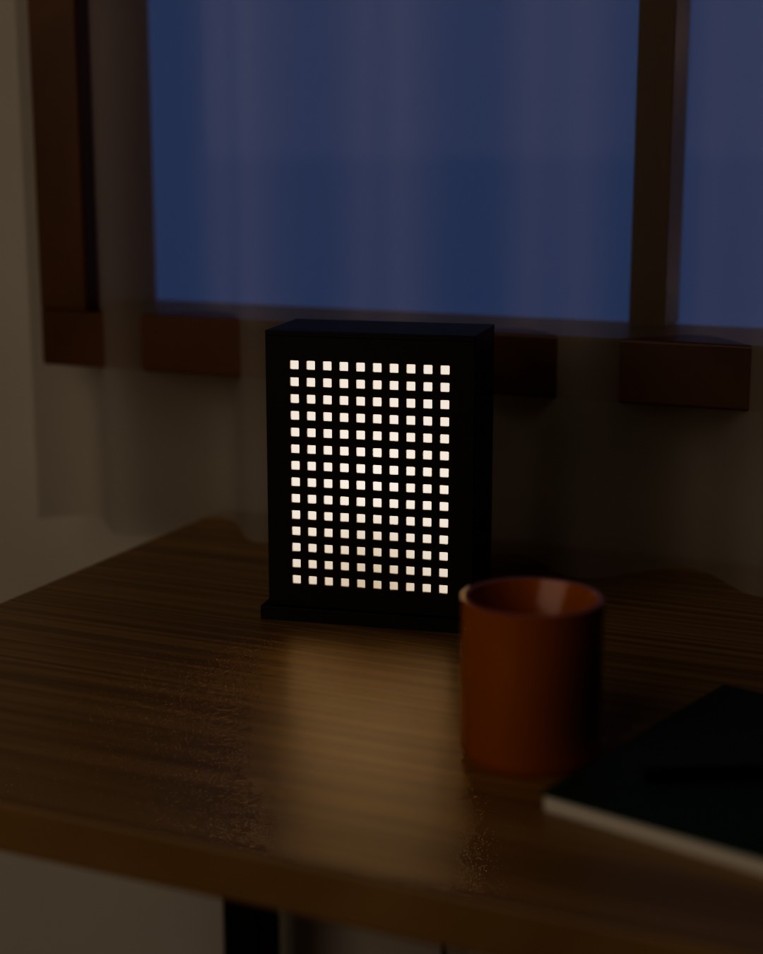MATRIX table lamp in graphite, switched on, on a work desk